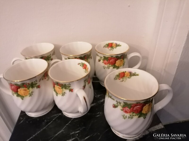 6 beautiful pink mugs in mint condition