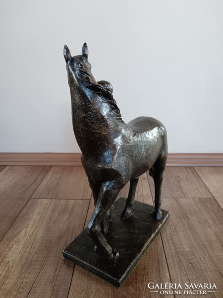 Old bronze statue of a boy with a horse, Croatian