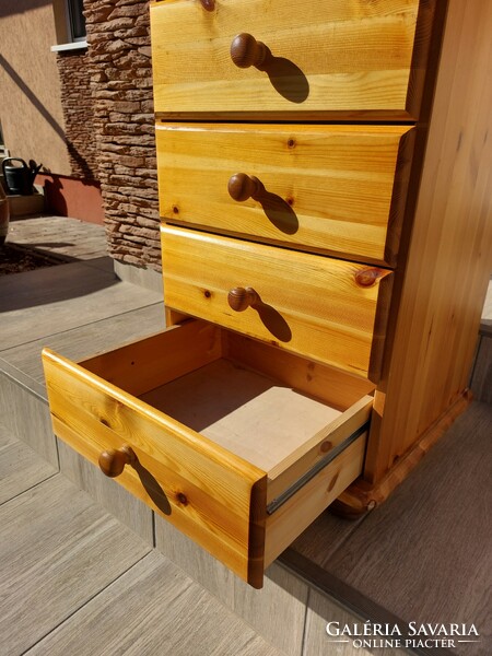 A 5-drawer pine chest of drawers for sale. Furniture is beautiful, in like-new condition.