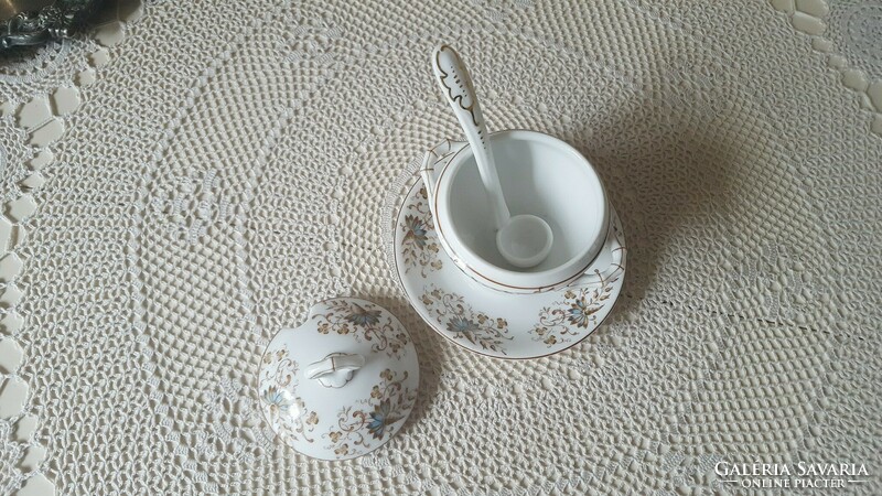 Beautiful old porcelain bowl with mustard and jam, with spoon