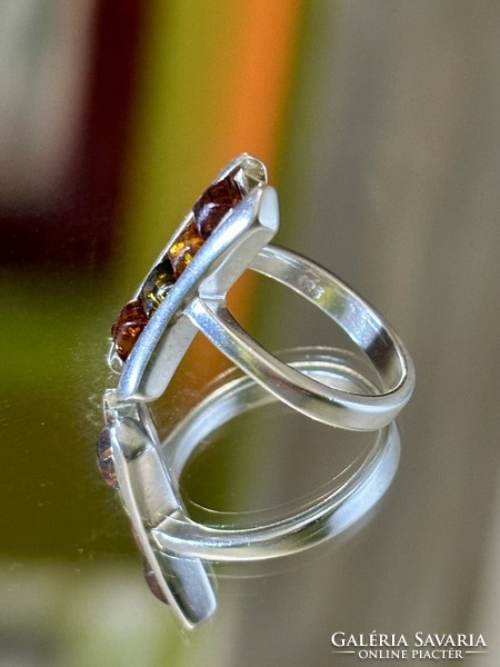 Unique silver ring with amber inlay