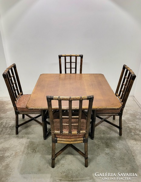 Vintage Italian mid century modern rattan dining table with four chairs