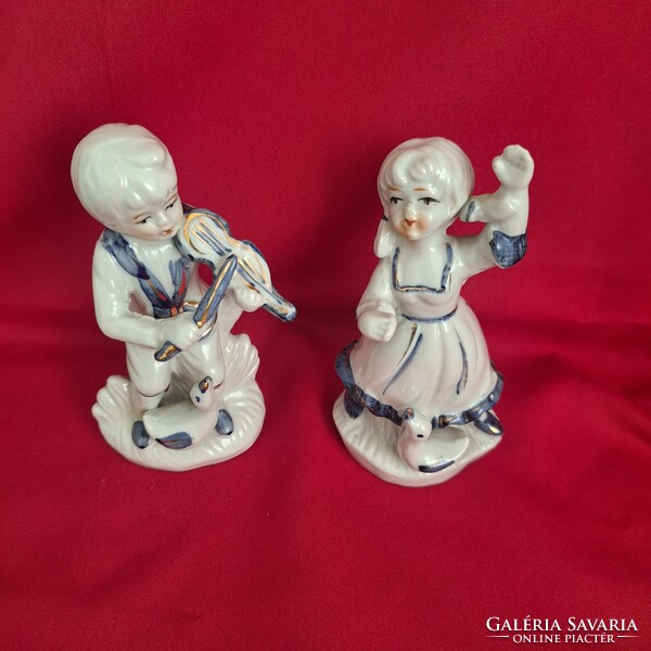 Blue and white porcelain dancing girl and violin boy