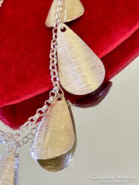 Beautiful silver bracelet embellished with pendants