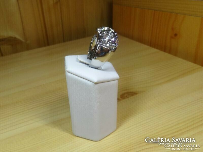Medical steel ring with lots of crystal stones, silver color, very beautiful, shiny. Stable ring.