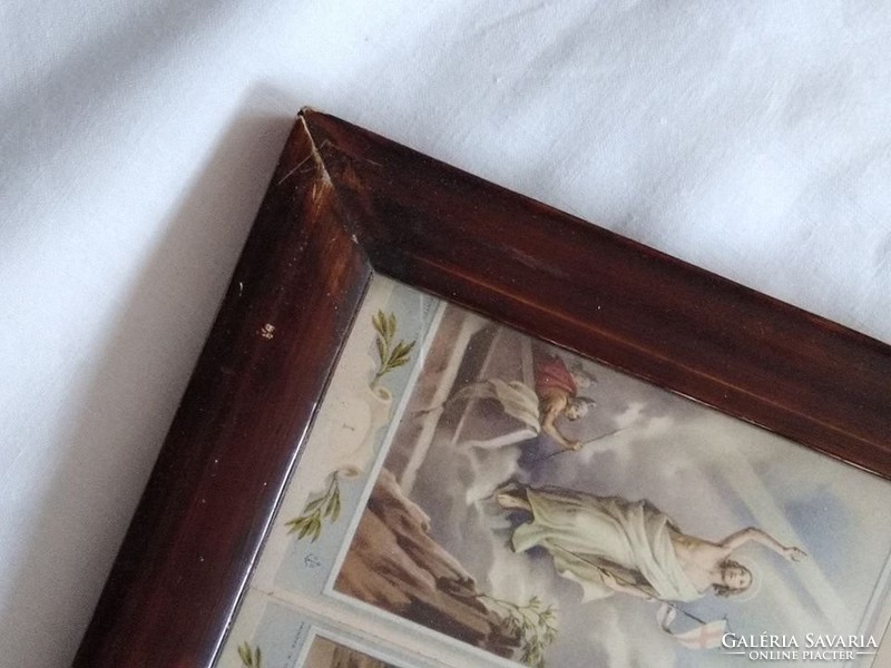 Series of antique holy pictures in a wooden picture frame