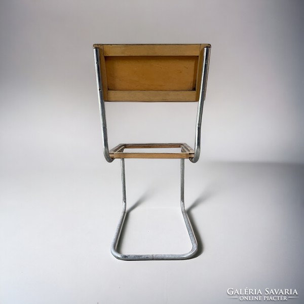 Retro, loft, industrial design tubular frame chair
