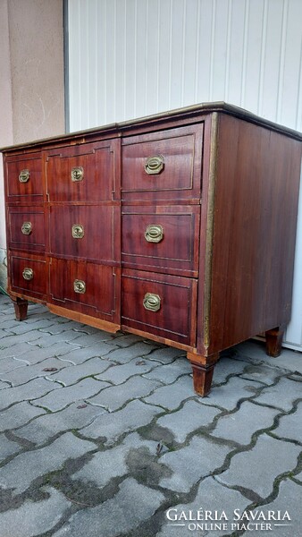 A 200-year-old chest of drawers with copper fittings