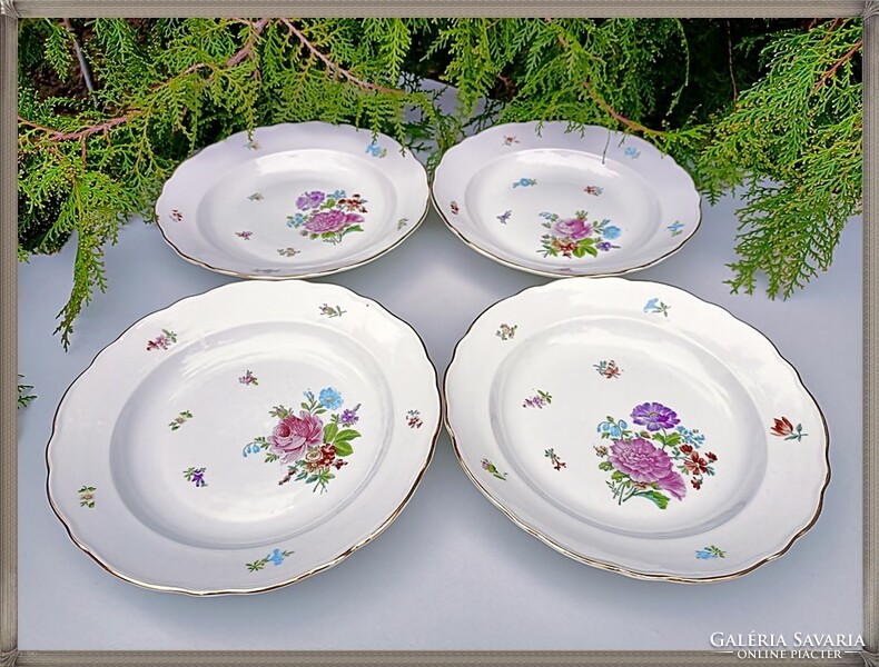 Antique porcelain deep plates with flower pattern