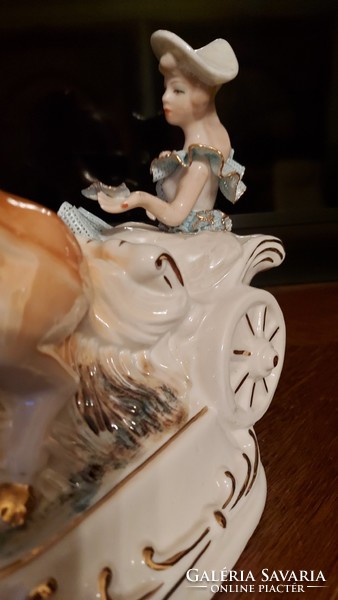 Large porcelain horse tooth. Lady in baroque dress