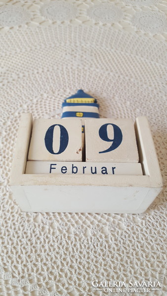 Wooden perpetual calendar with lighthouse