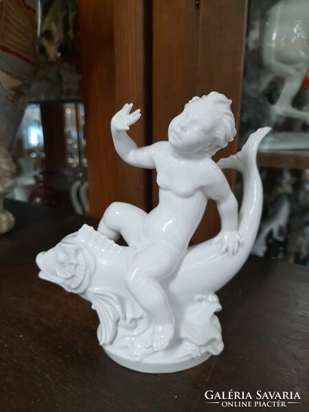 German, Germany Rosenthal putto sitting on a fish, child figural sculpture, porcelain figure. G. Opel. 14.5 Cm.