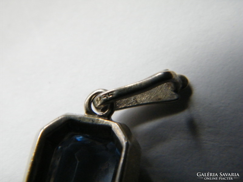 Antique silver pendant with blue stones