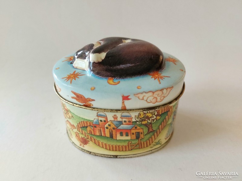 Small metal box with a fairy tale pattern