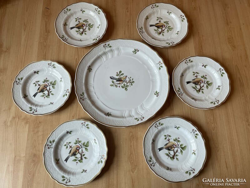 A modern extremely rare porcelain cookie dinner set with a Ravenclaw bird pattern
