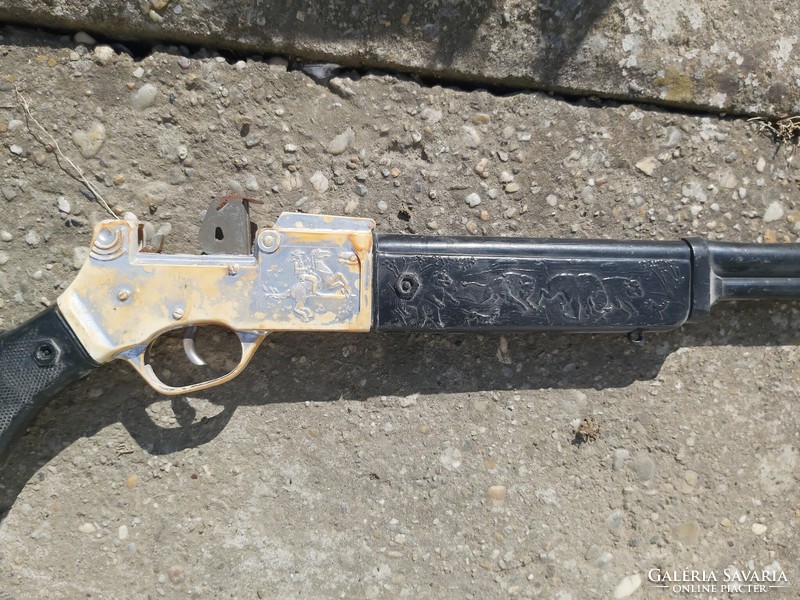 Old cartridge metal toy pistols