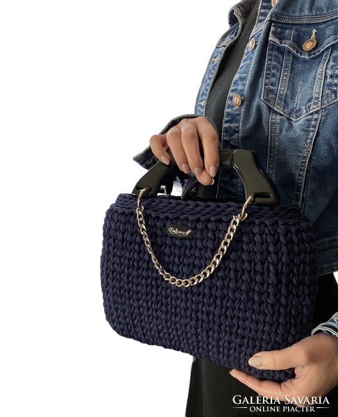 Crochet bag with plastic tabs