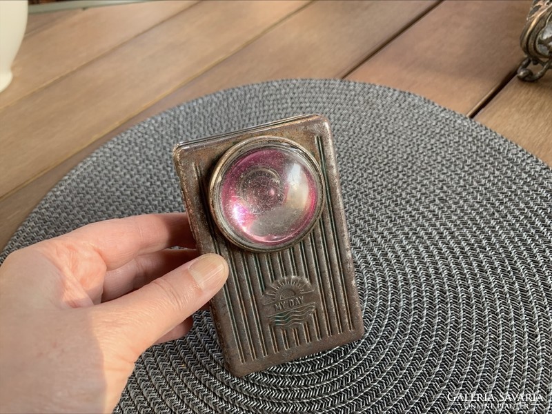 Old my day flashlight with pink bulb and convex magnifying lens