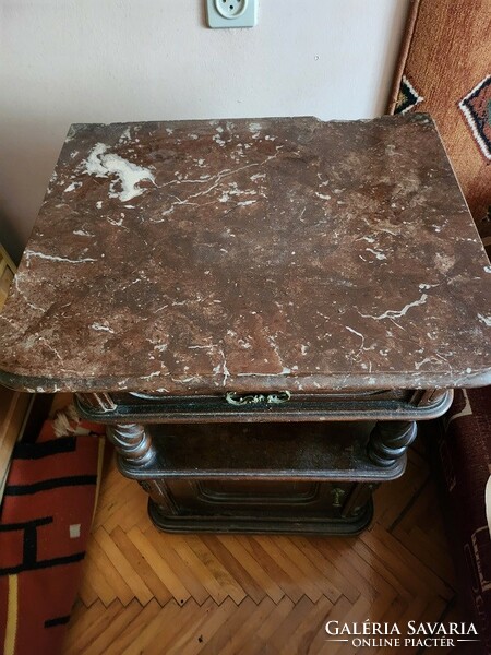 Two bedside tables with marble tops