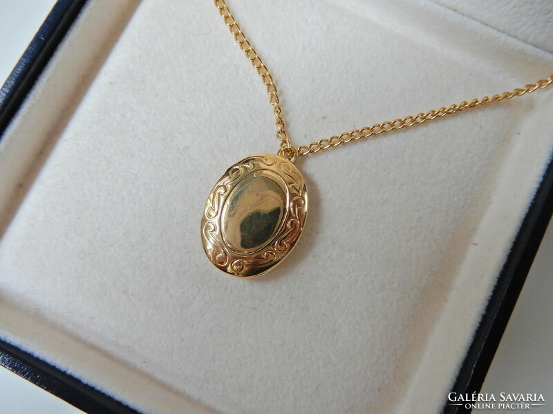 Old gold-plated pendant with photo holder on a chain