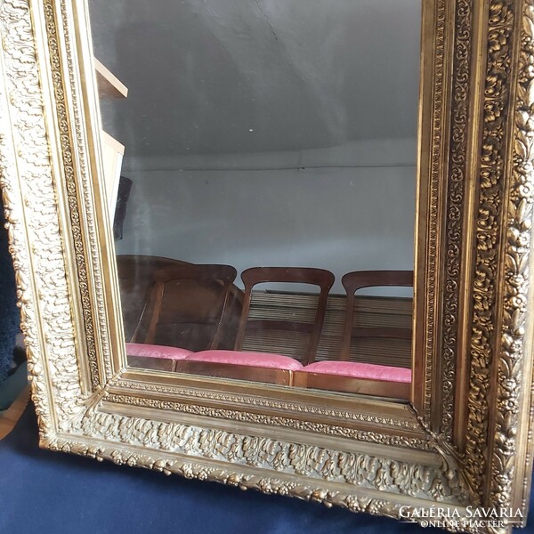 Antique picture frame with mirror.
