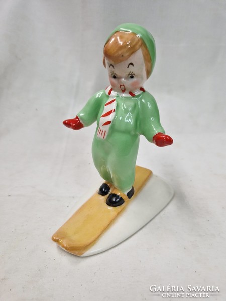Old granite Kispest skiing boy with rare painting 13 cm.