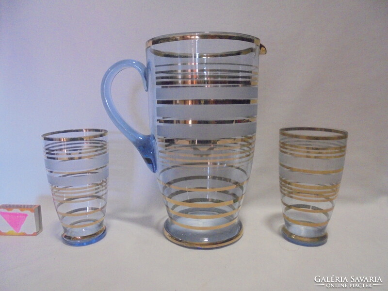 Old pale blue, richly gilt glass jug with three glasses