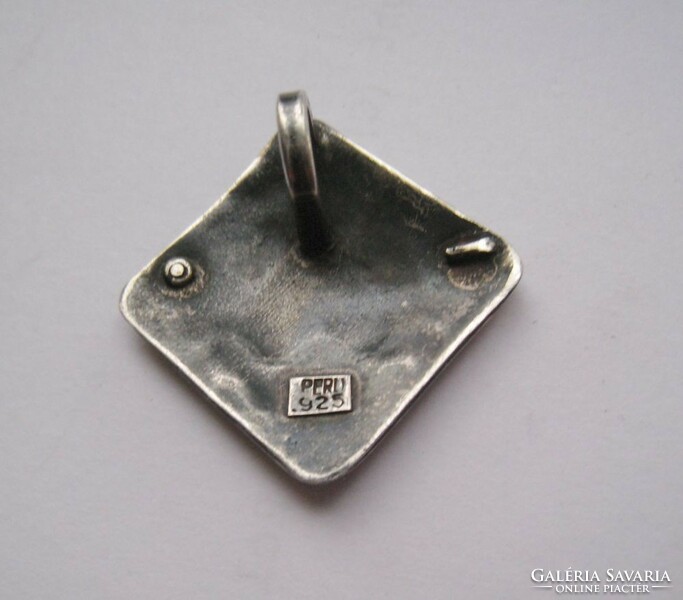 Peruvian silver pendant, with symbol, gold decoration, amulet type