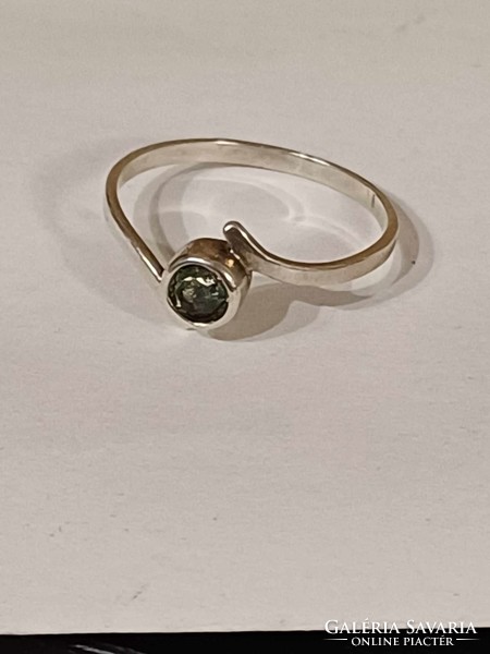 Silver ring with green stone