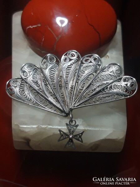Old filigree fan-shaped silver brooch with imperial cross