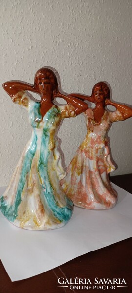 Glazed, fired clay dancing women. Two darts, in different colors n
