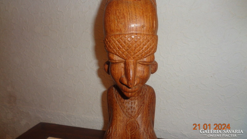 African lady, breast statue beautifully carved from wood