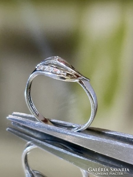 Shiny, graceful silver ring, embellished with white zirconia stones