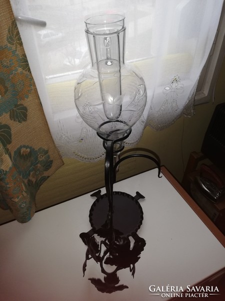 Engraved glass wine dispenser, with ice cube holder, on a wrought iron stand