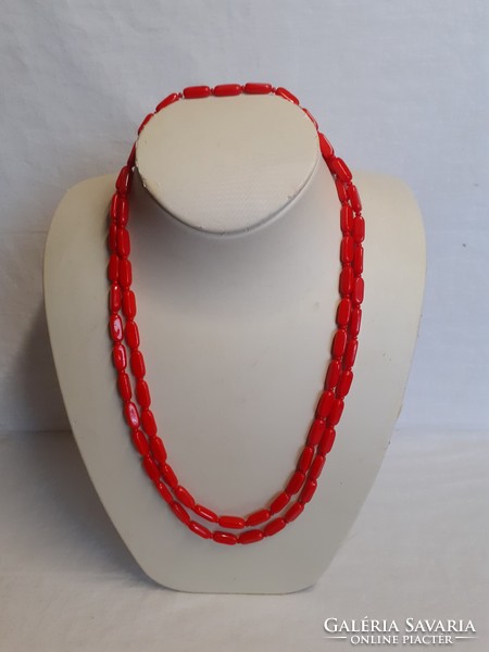 Retro necklace made of long red porcelain beads in good condition