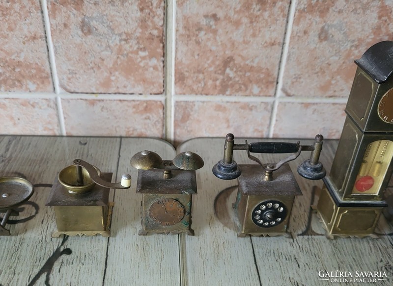 7 mini copper items together, telephone, bell, standing clock, grinder, jug, scale, telephone
