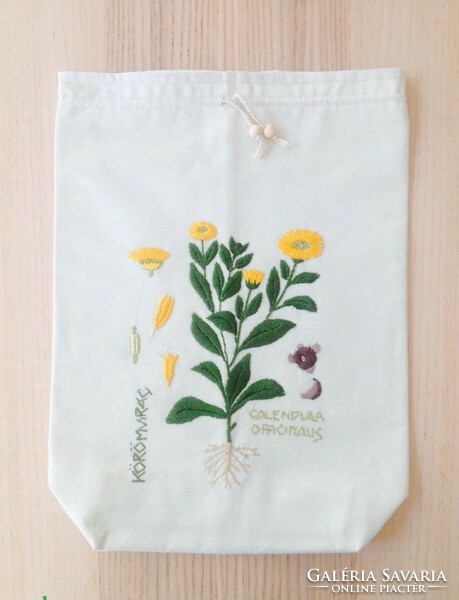 Embroidered herbal bag with marigold pattern