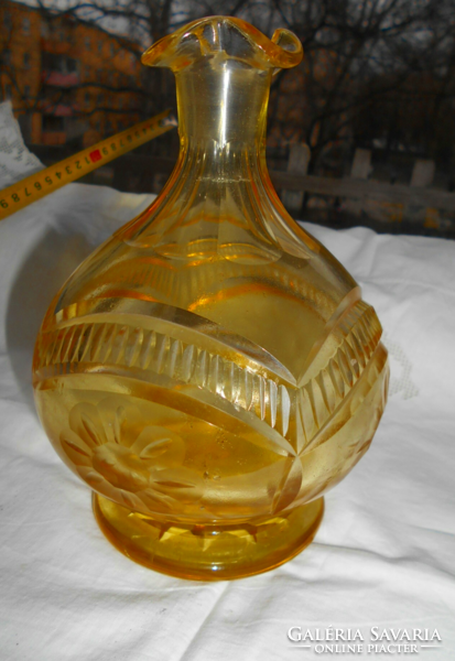 Antique polished yellow glass bottle