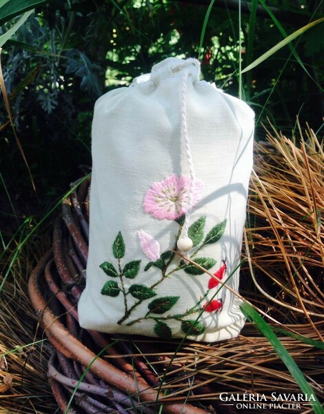 Embroidered herbal bag with rosehip pattern