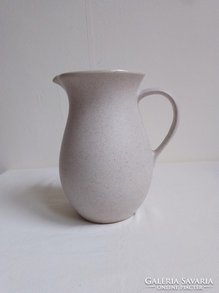Nice small stoneware porcelain jug with a fine floral pattern, 18 cm