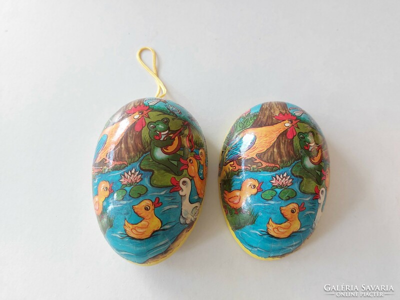 Retro papier-mâché Easter egg with a musical frog pattern