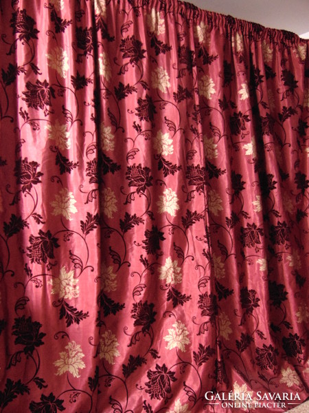 A pair of wonderful burgundy red baroque blackout curtains