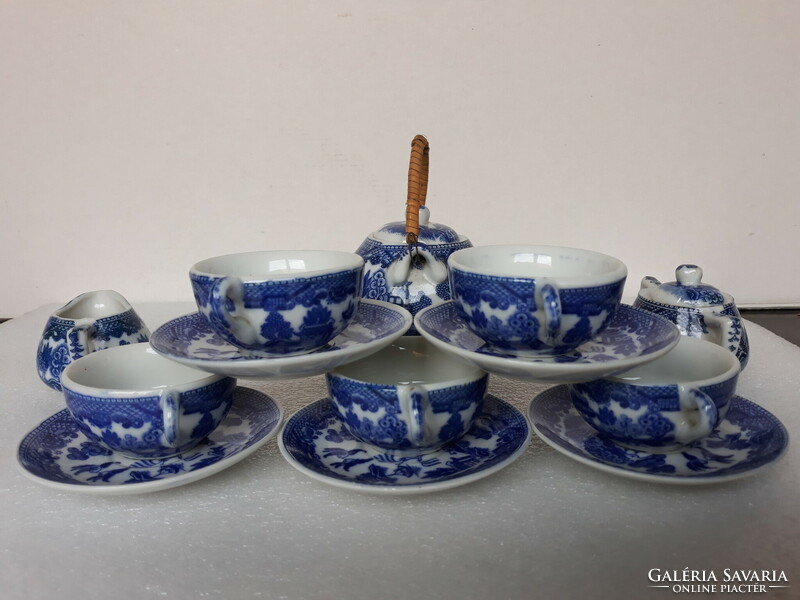 Beautiful toy porcelain tea set for a doll house