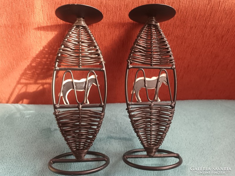 Pair of iron candle holders, painted zebra decoration, braided body.
