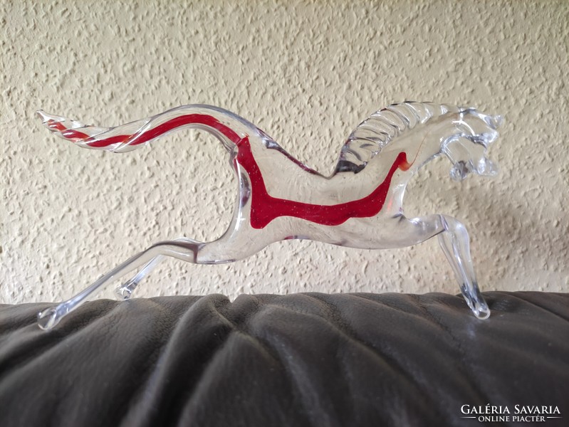 Colorful galloping glass horse. From the legacy of photographer G.