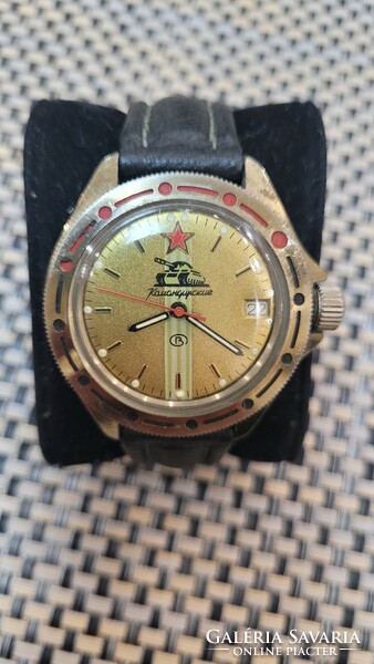Soviet komandirskie mechanical watch with a tank. Rare gold-colored dial.