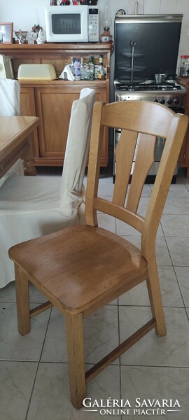 Solid oak dining table + 6 chairs in perfect condition