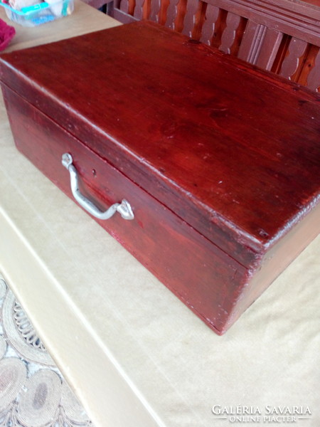 Antique traveling wooden chest, suitcase.