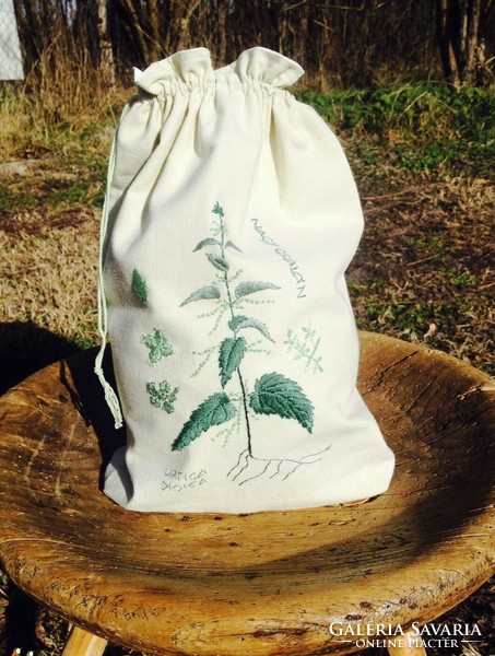 Embroidered herbal bag with nettle pattern