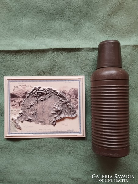 A thermos and a map